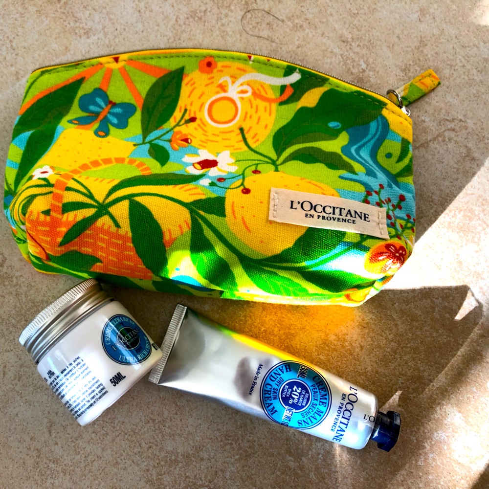 Brand new: L’Occitane travel case with two travel size lotions